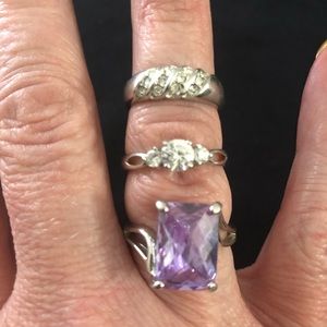 3 size 9 rings and pair of sparkly earrings